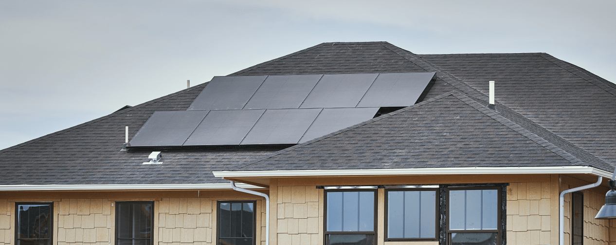 Sunnova installing solar panel racking on roof